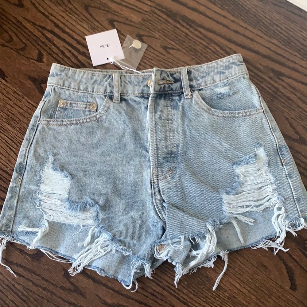 adika BRAND NEW jean shorts ripped (size 24)